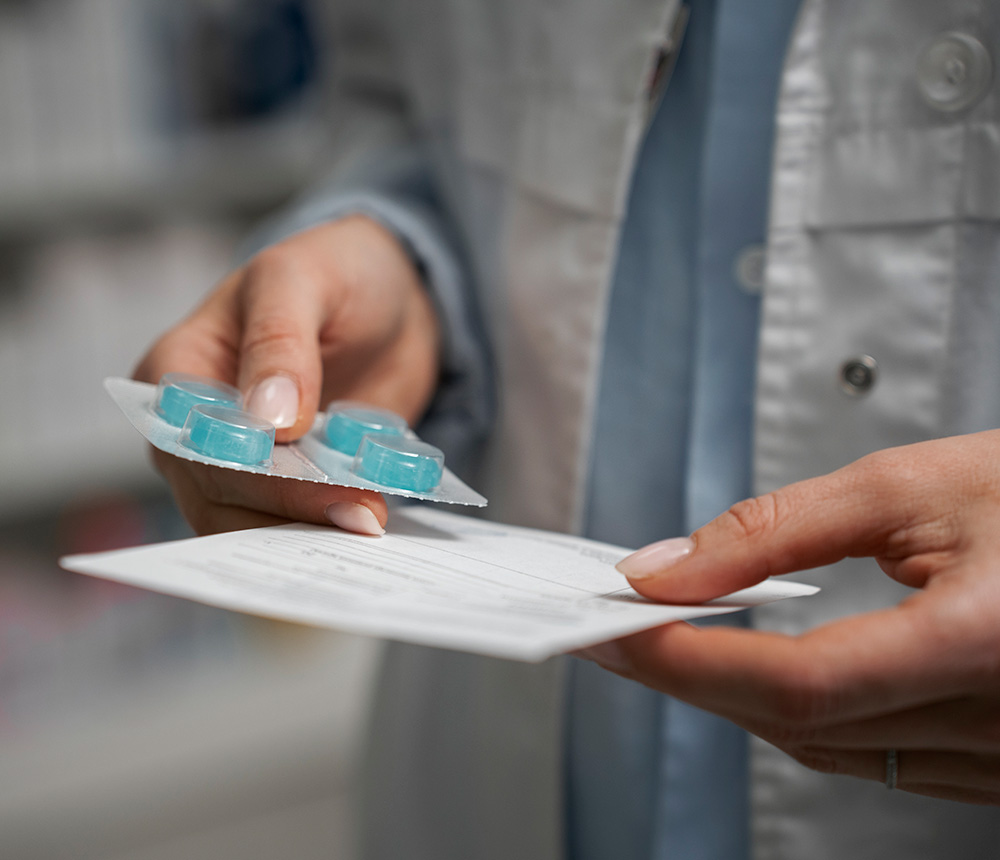 female-pharmacist-with-pills-medicine9